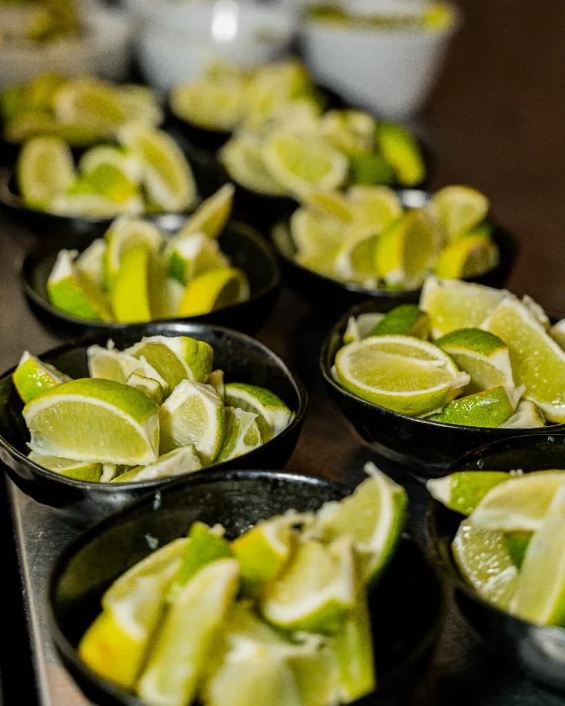 Fresh lime wedges prepared for Superchido Mexican catering service